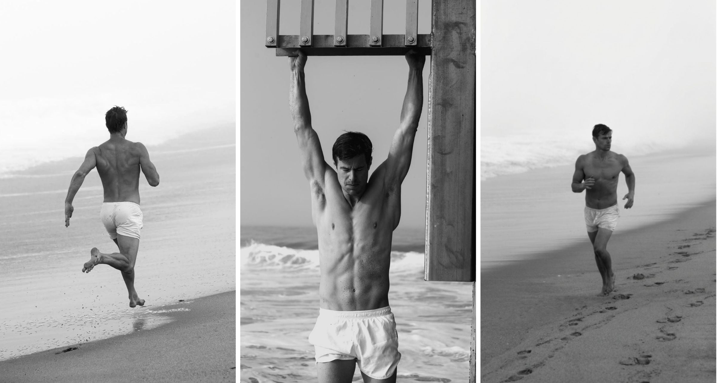 A triptych of black-and-white photographs showing a shirtless man wearing IOAN Jersey Boxers on a beach: running near the shoreline on the left, hanging from a pier structure in the center, and running along the beach on the right.
