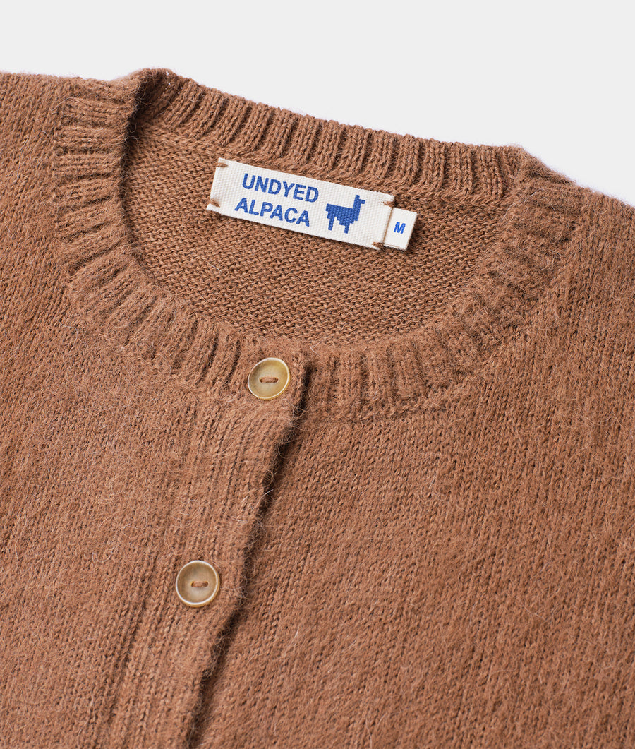 Close-up detail shot of a medium-sized brown Undyed Alpaca sweater with button closure - Industry of All Nations