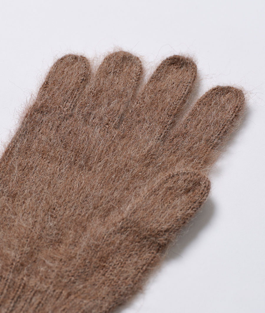 A close-up detail shot of a pair of brown wool gloves against a white background - Industry of All Nations