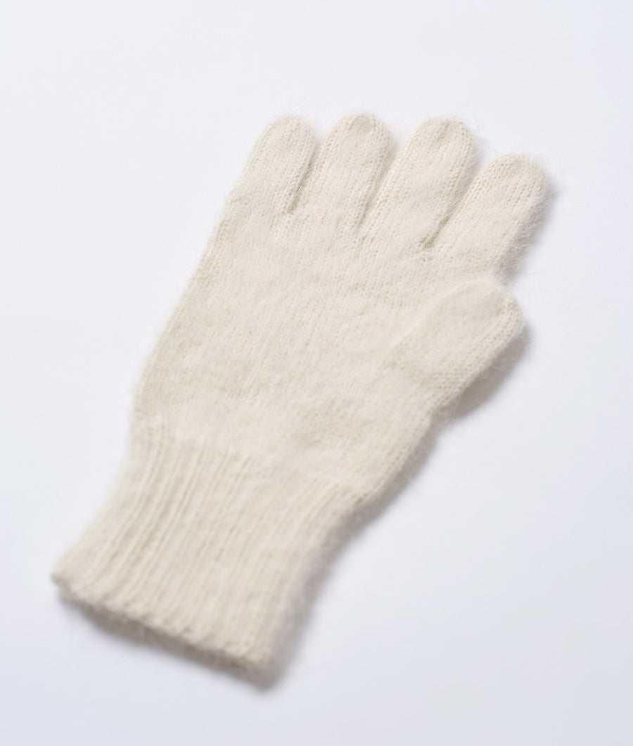 A pair of cream-colored knitted gloves displayed on a flat surface - Industry of All Nations