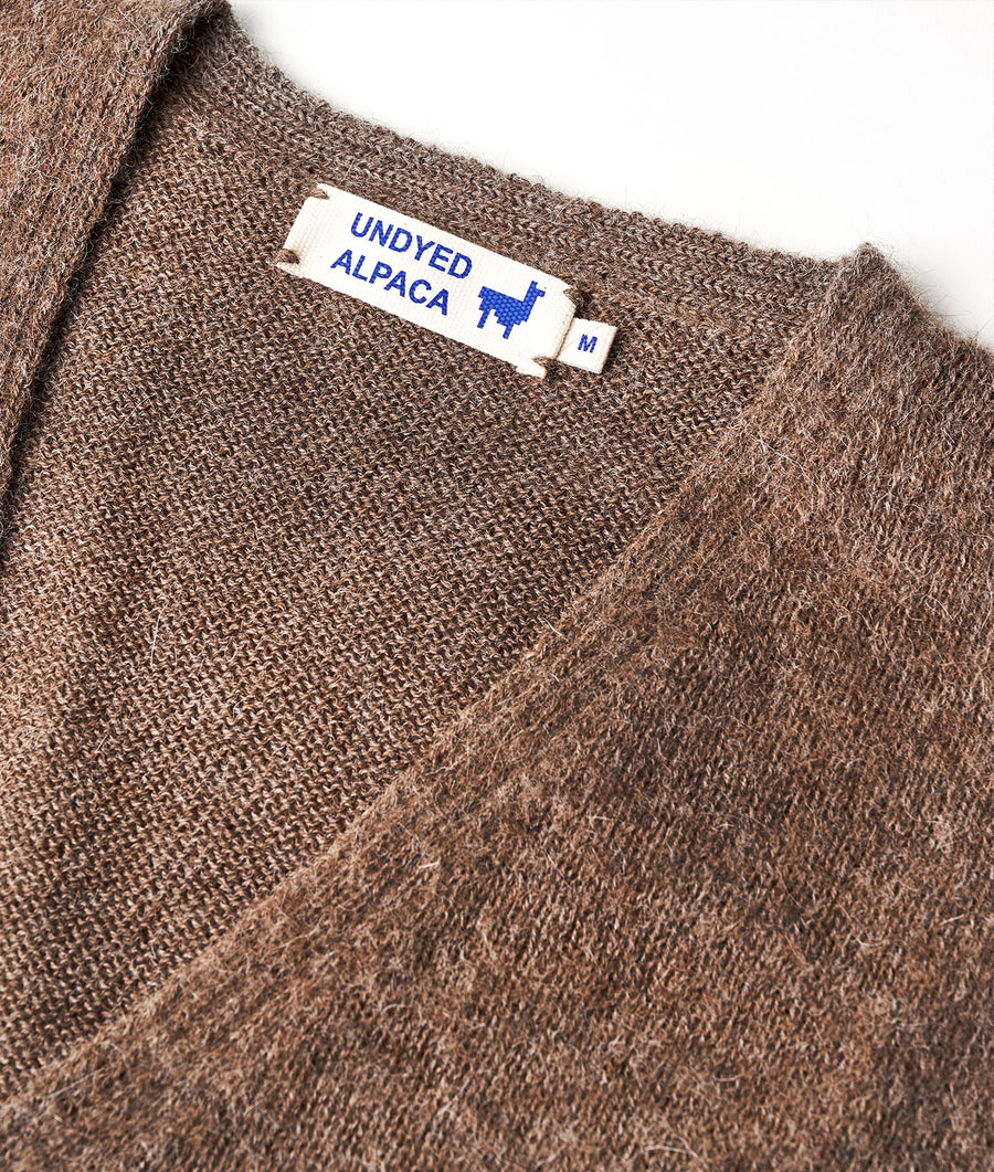 Closeup detail shot of a brown alpaca sweater made by Industry of All Nations.