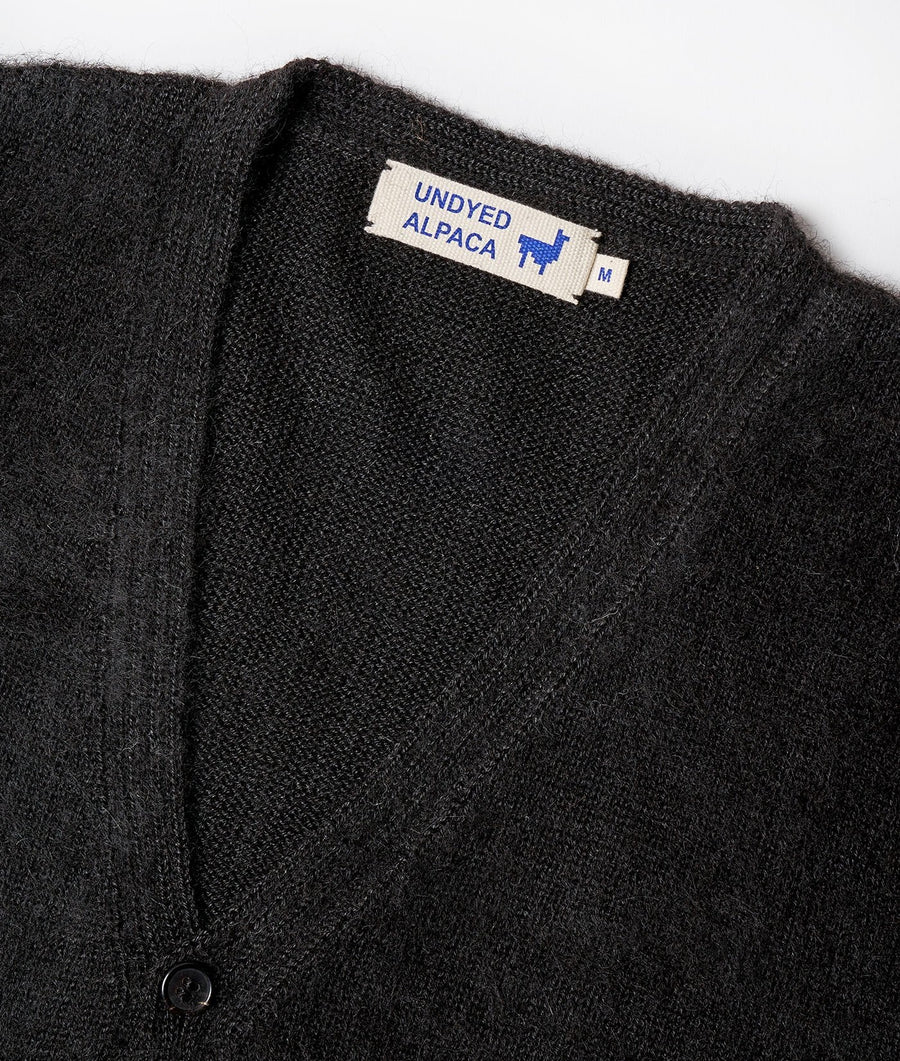 Black alpaca sweater with 'Undyed Alpaca' logo label - Industry of All Nations