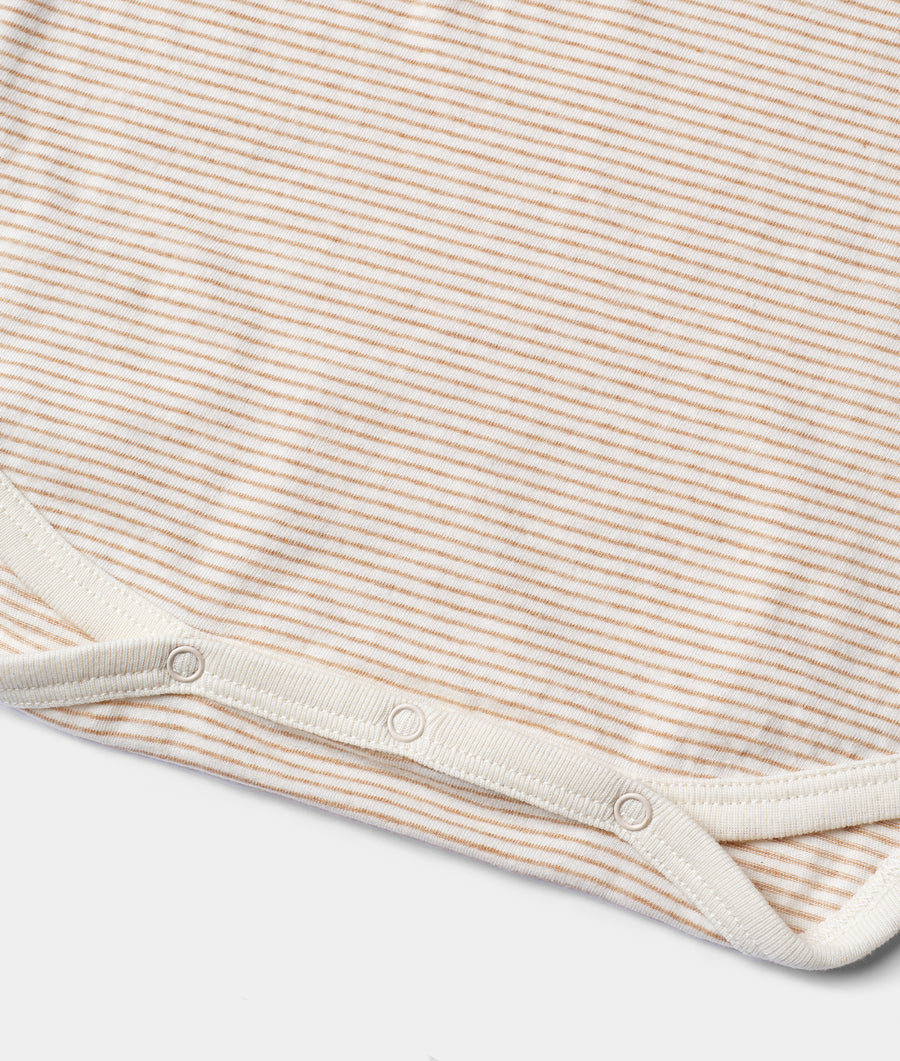 Beige and white striped organic cotton tank top, flat lay view with button detailing - Industry of All Nations