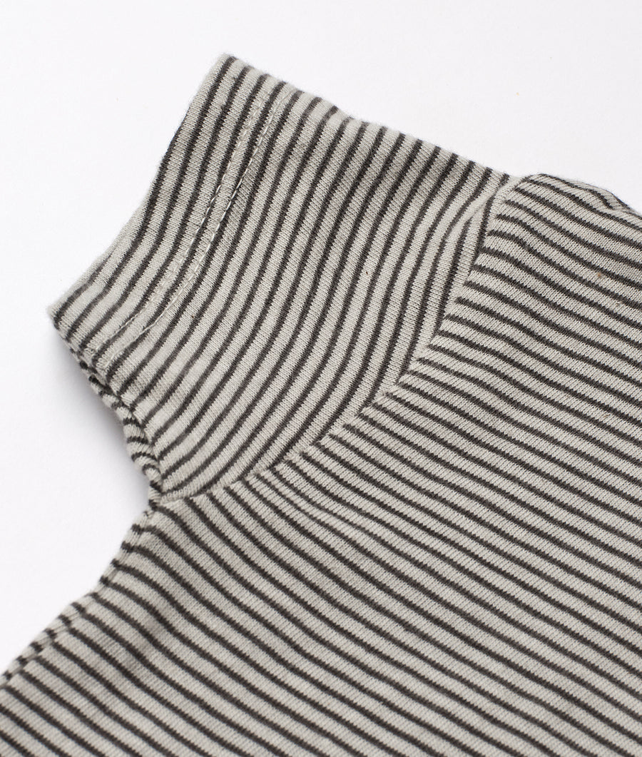 Striped gray and white organic cotton fabric in a close-up detail shot - Industry of All Nations