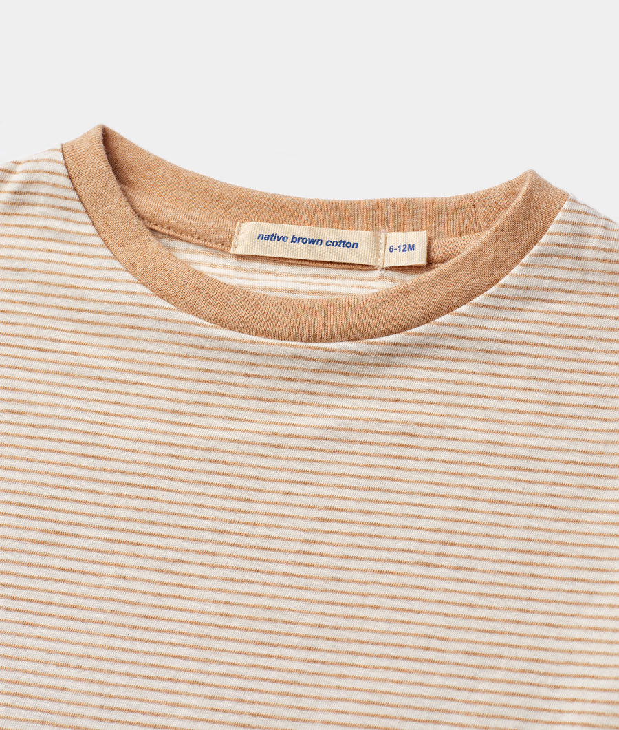 Close-up detail shot of a beige and white striped organic cotton crewneck sweater - Industry of All Nations