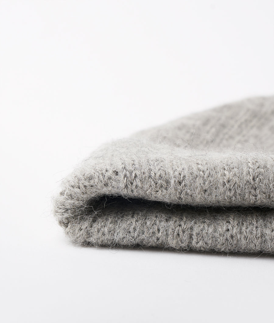 Detail shot of a gray, fuzzy fabric with a textural, plush appearance - Industry of All Nations