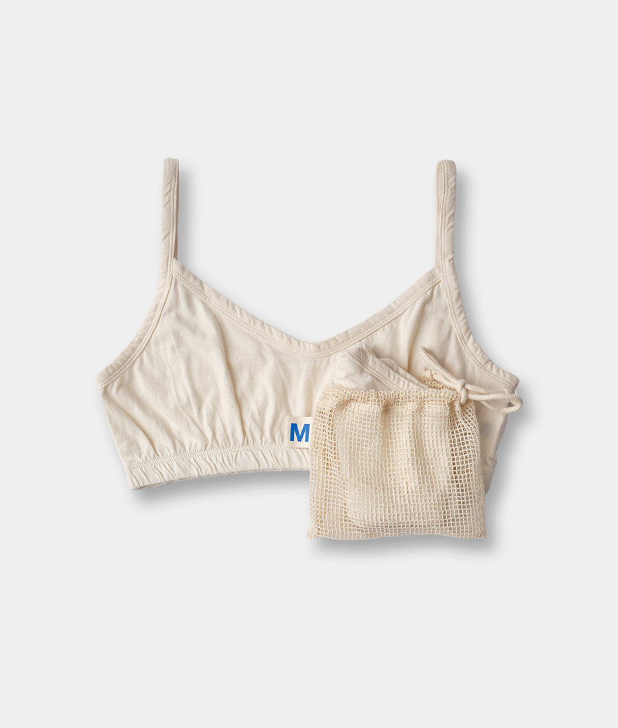 Neutral-colored bralette and matching mesh drawstring bag displayed on a plain background - Industry of All Nations