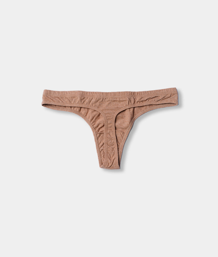 Flat lay image of a women's tan organic cotton thong underwear - Industry of All Nations