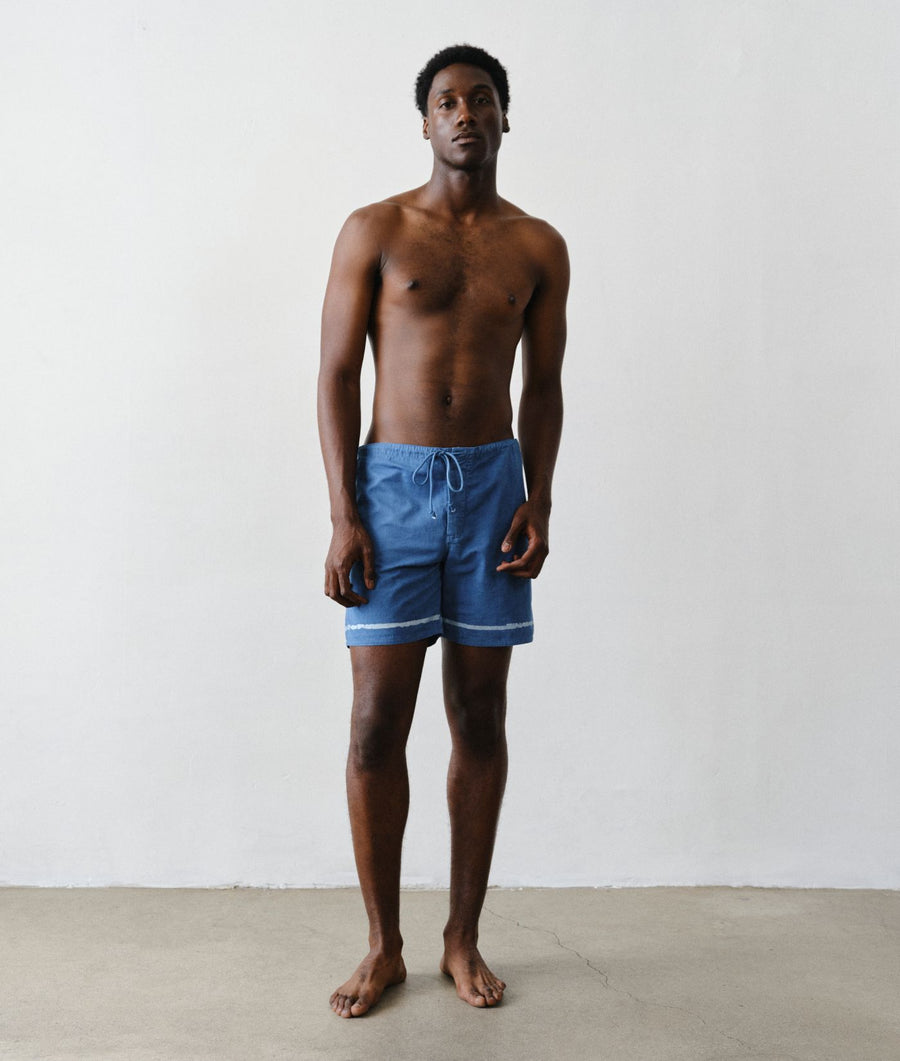 Man wearing Clean Boardshorts in Batik Linea