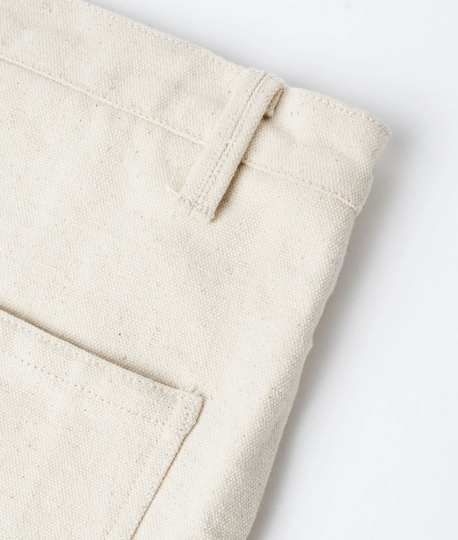 Detail shot of a cream-colored organic cotton canvas tote bag from Industry of All Nations.