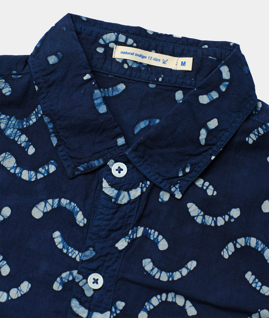 Navy blue patterned organic cotton shirt with natural indigo dye, displayed in a flat lay shot - Industry of All Nations