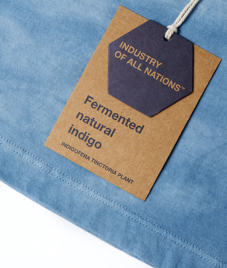 Fermented natural indigo denim fabric with Industry of All Nations tag - Industry of All Nations
