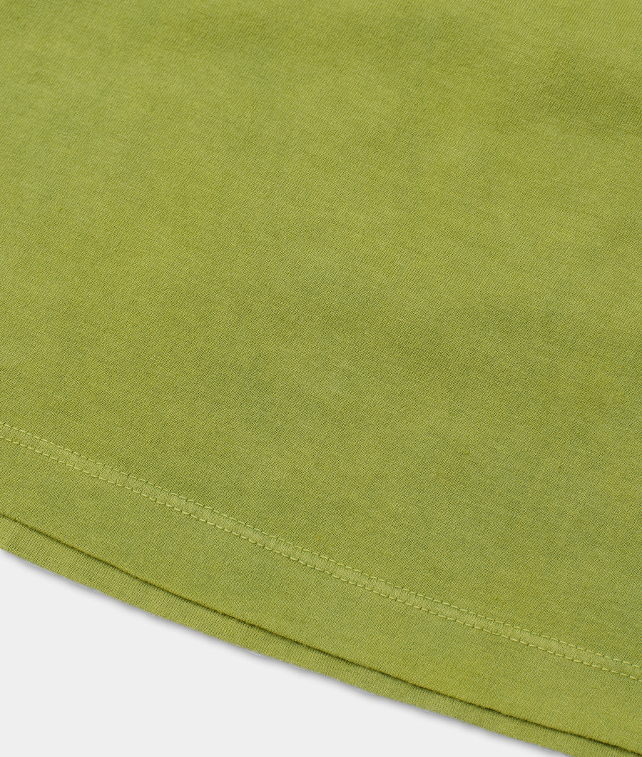 Flat lay image of a lime green organic cotton t-shirt with a stitched detail along the hem - Industry of All Nations
