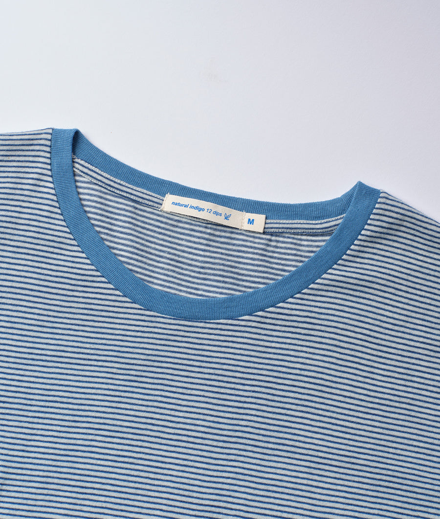 Close-up image of a blue and white striped crew neck t-shirt from Industry of All Nations.