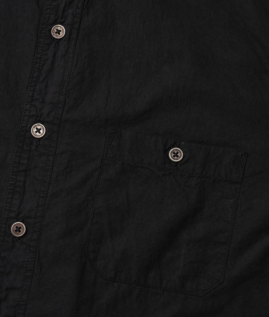 Black button-down shirt with four buttons shown in a detailed shot - Industry of All Nations