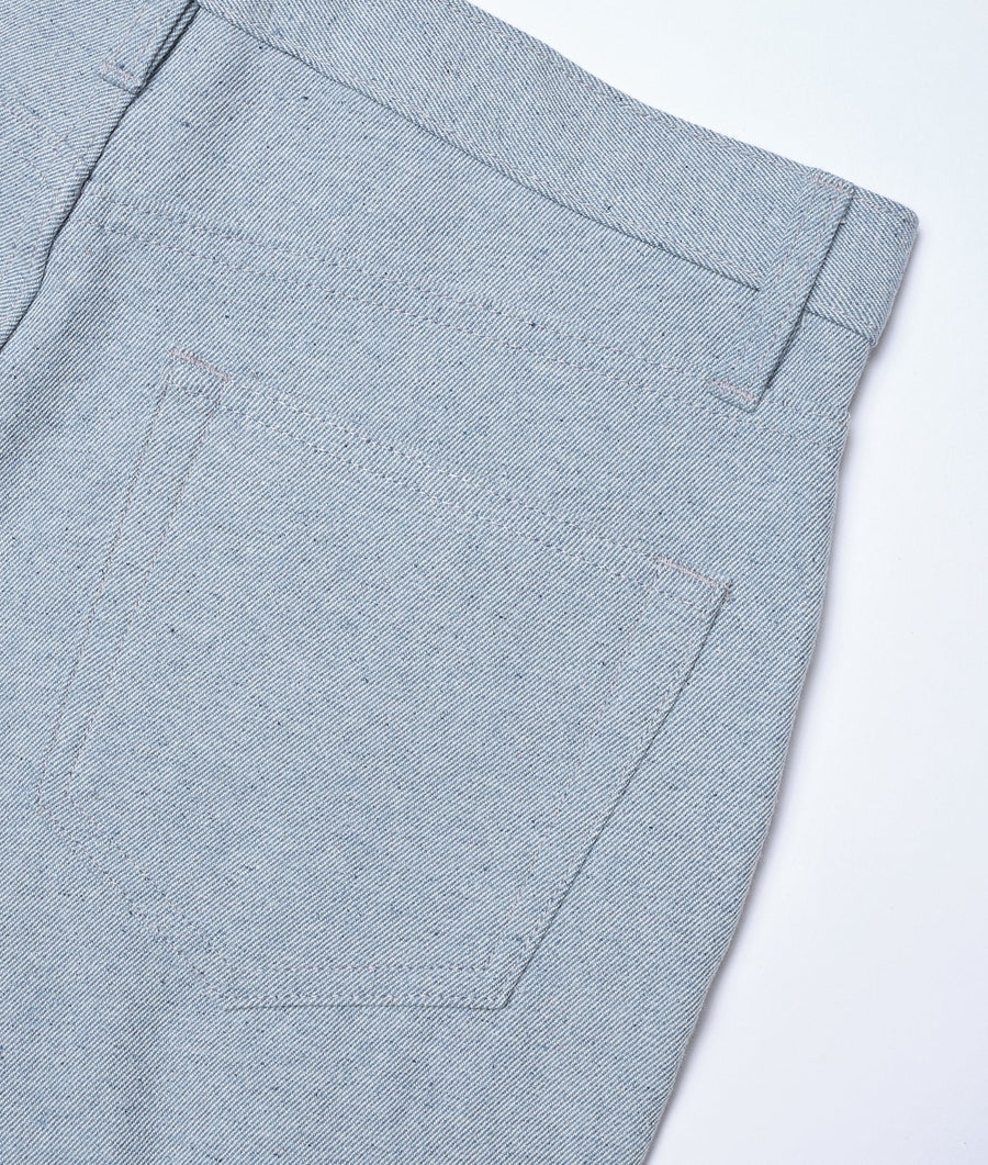 Close-up detail shot of a grey organic cotton denim jeans with pockets and stitching - Industry of All Nations