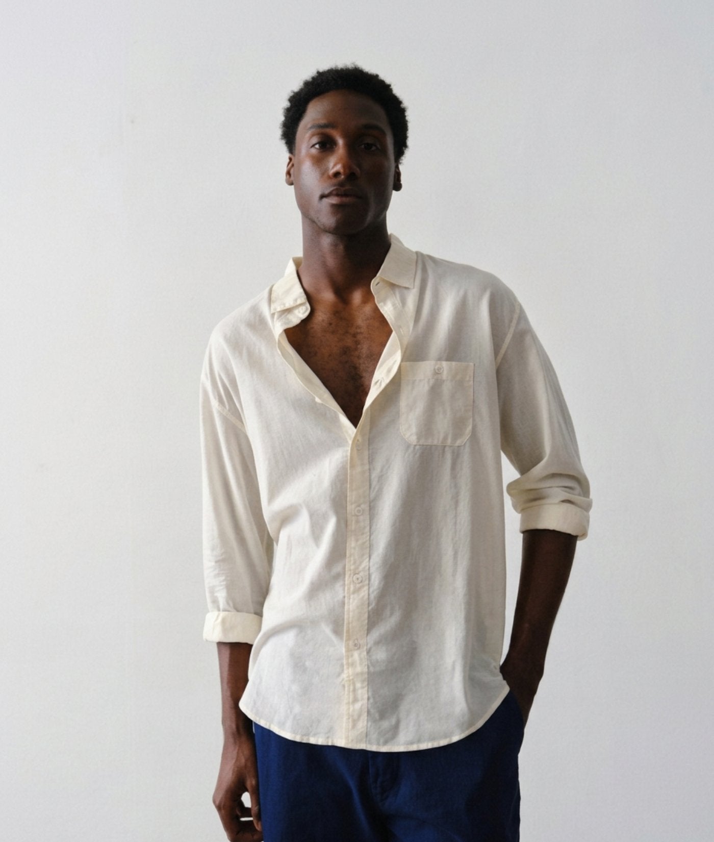 Man wearing IOAN Classic Madras Shirt in organic cotton