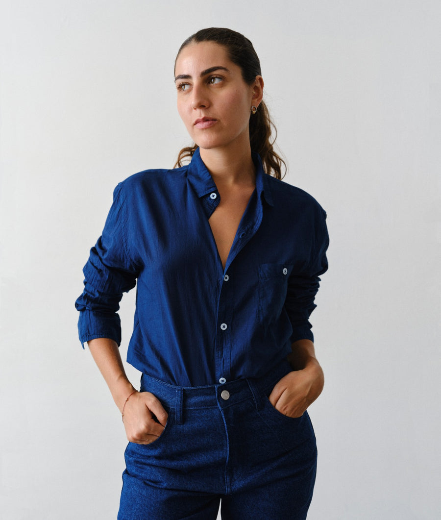 Woman wearing the IOAN Classic Madras Lightweight long-sleeve shirt in Indigo 12