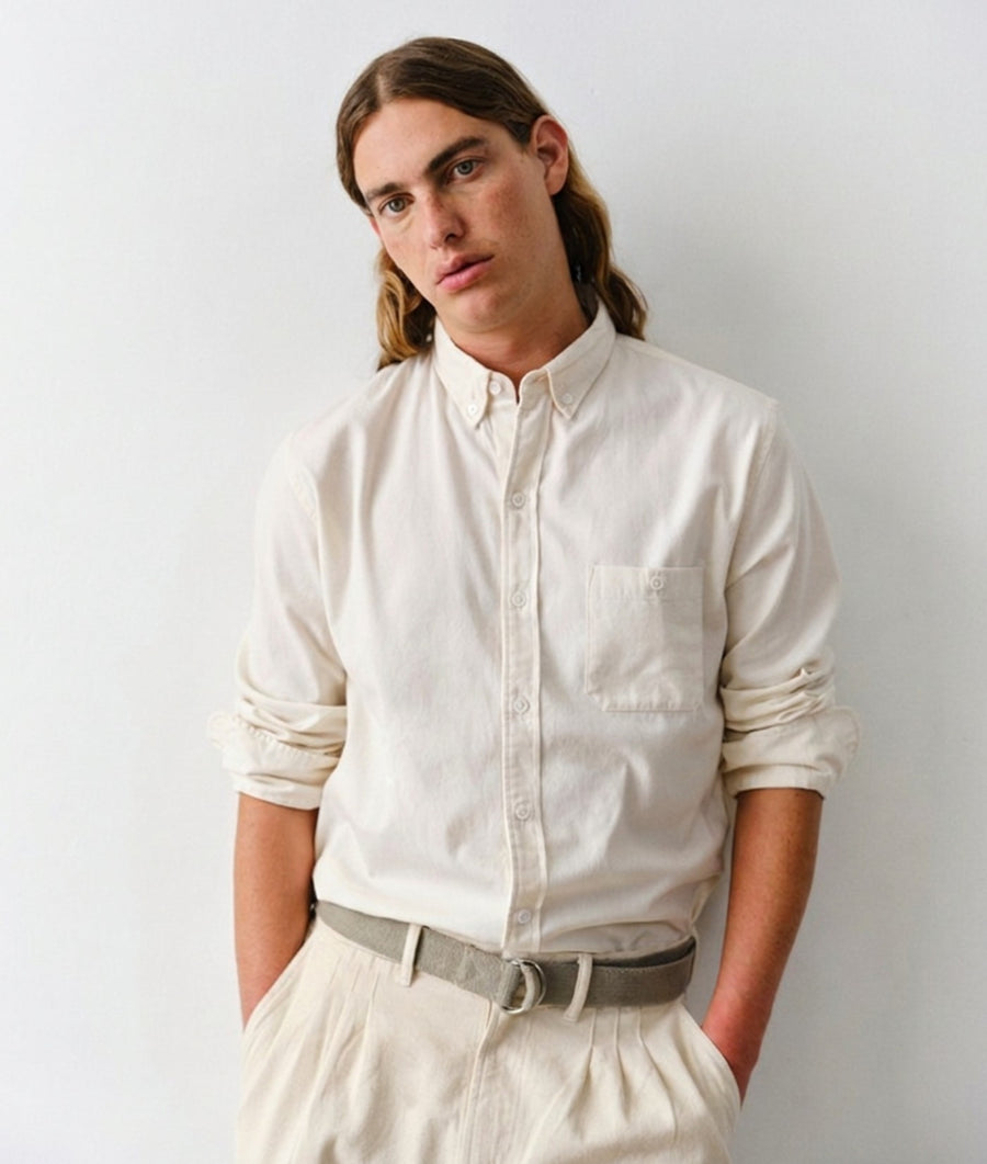 Man wearing the IOAN Classic Madras long-sleeve shirt in Undyed