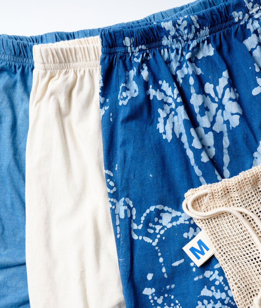 Tie-dye patterned cotton shorts with drawstring waist and natural burlap label - Industry of All Nations