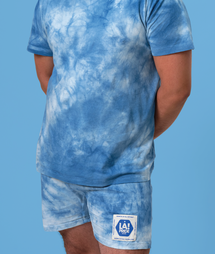 Blue tie-dye short sleeve t-shirt and shorts set, worn on a model - Industry of All Nations
