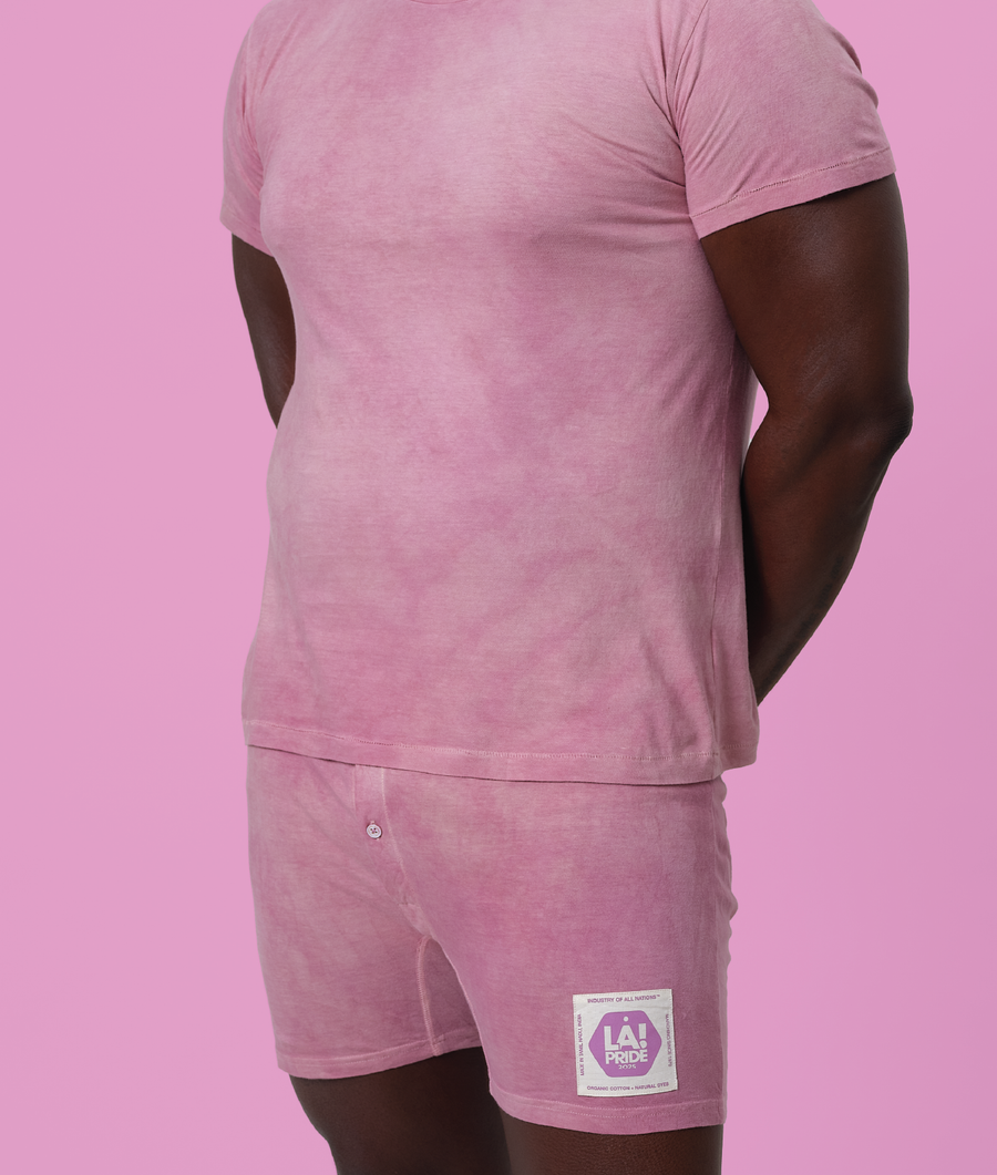 Pink cotton t-shirt and shorts set worn on model, with 'LA Pride' patch - Industry of All Nations