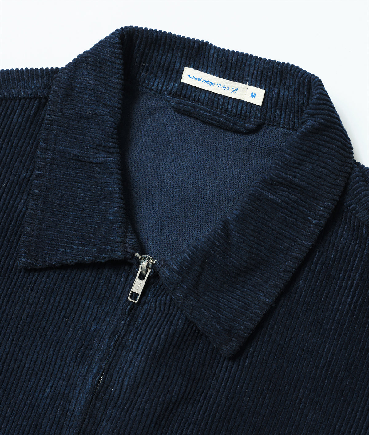 Natural indigo shirt collar with a 12 Dips label