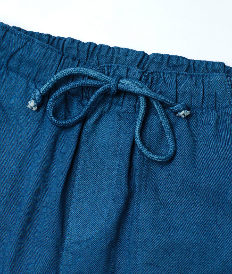 Detailed close-up shot of a pair of navy blue drawstring cotton shorts - Industry of All Nations