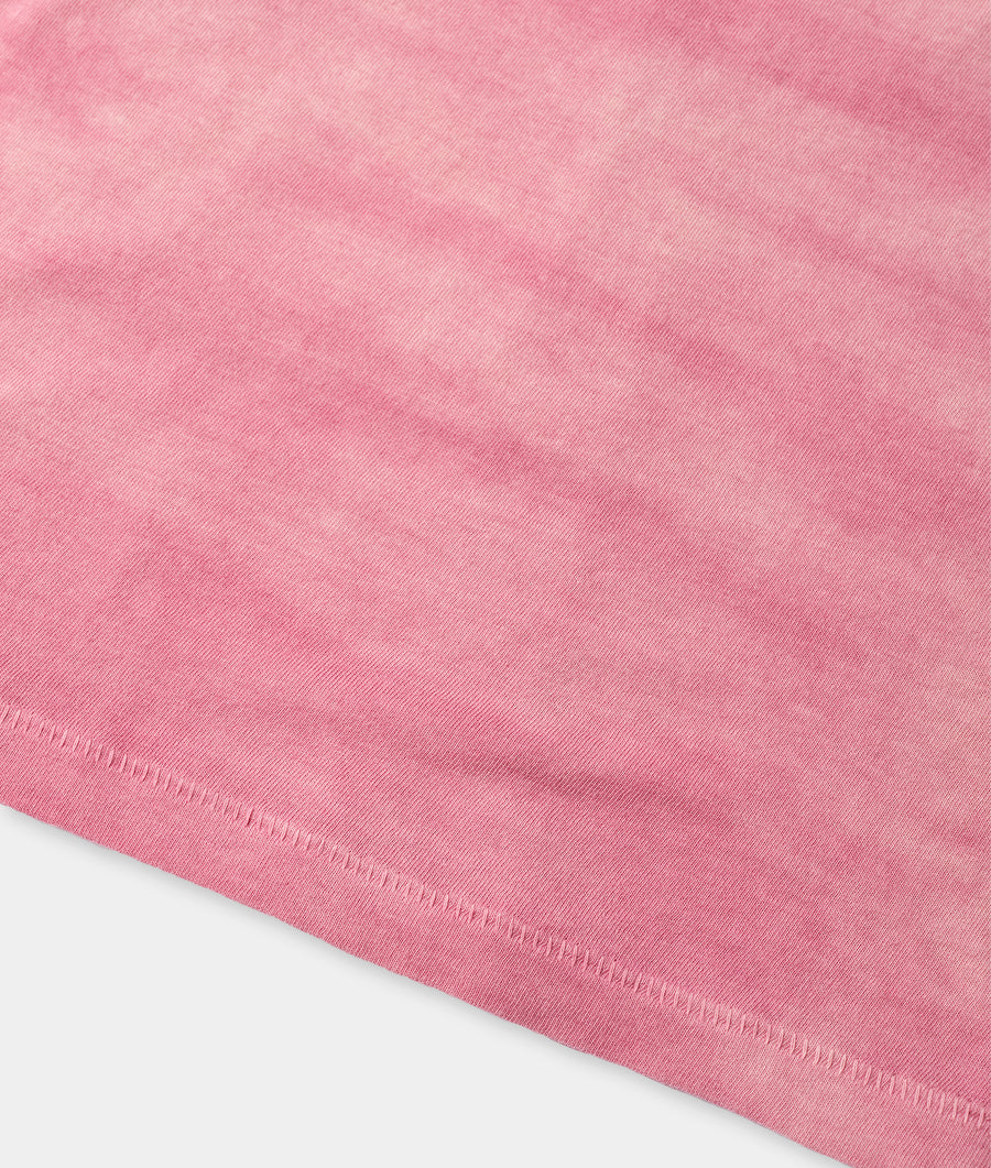 Flat lay image of a solid pink organic cotton scarf - Industry of All Nations