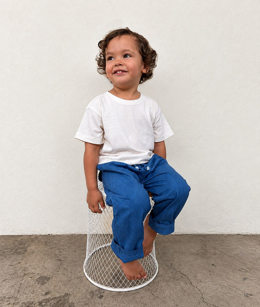Toddler wearing an IOAN Kids Clean Crewneck T-Shirt and Kids Ponya Drawstring Pants