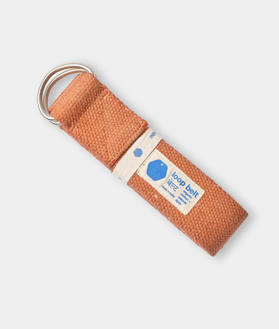 Crochet loop belt in orange, displayed flat on a white background - Industry of All Nations