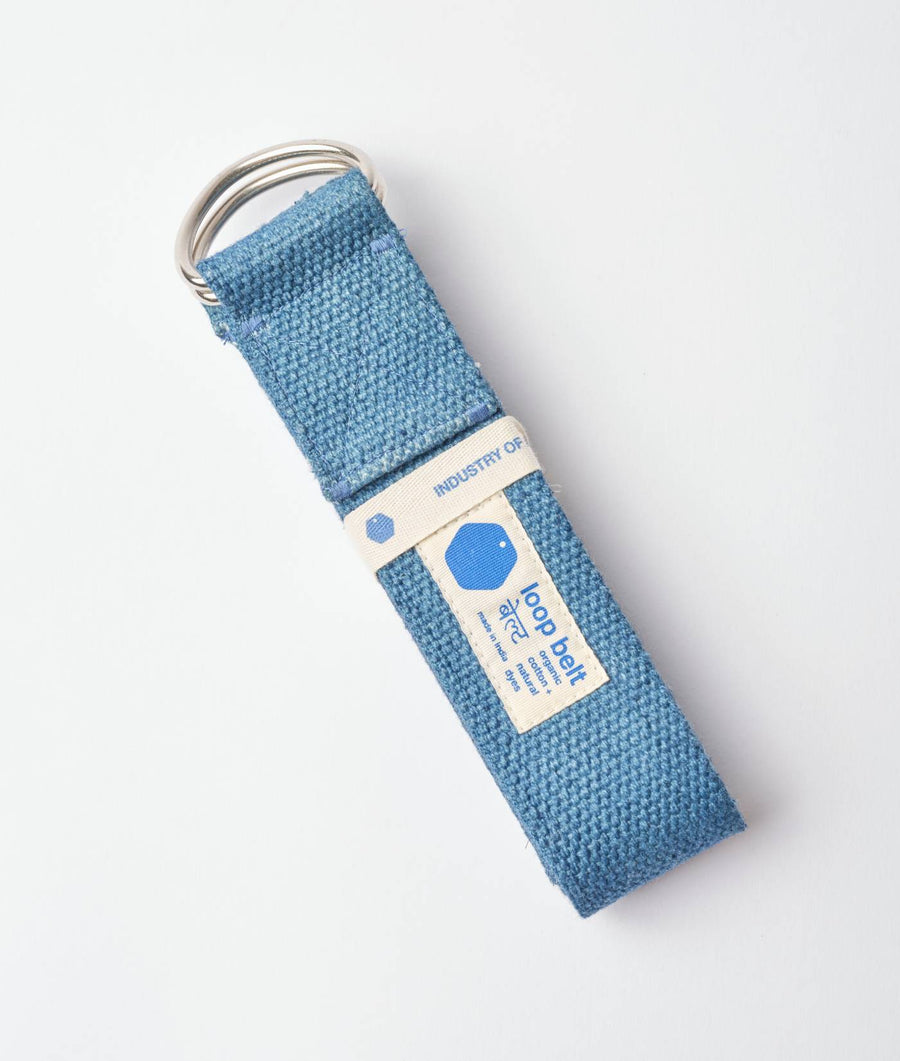 Flat lay of a blue-gray woven cotton key holder with a label that says "Industry of All Nations" - Industry of All Nations