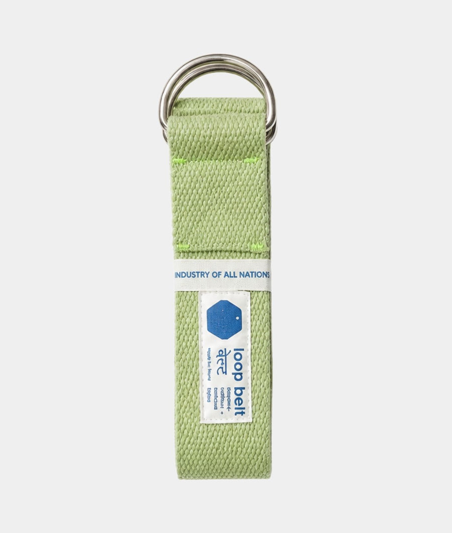IOAN Loop Belt in light green woven fabric, featuring a silver metal D-ring and a white fabric label band with the Loop Belt logo.

