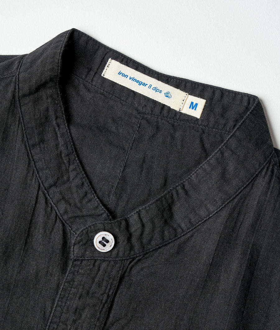 Flat lay image of a black iron vinegar shirt from Industry of All Nations - Industry of All Nations