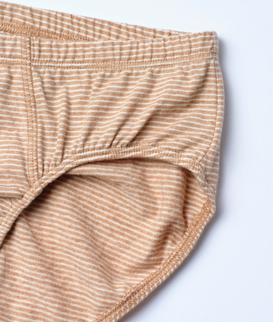 Detail shot of beige and white striped organic cotton underwear - Industry of All Nations