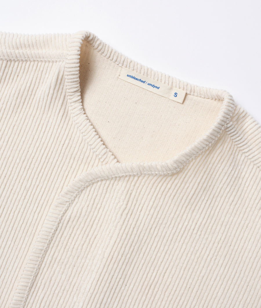 Close up detail shot of an unbleached, undyed organic cotton sweater with ribbed detailing - Industry of All Nations