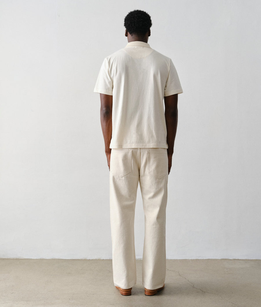 Man wearing IOAN New Jeans in Coco, back view