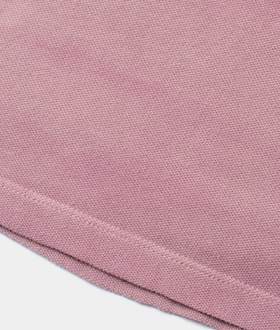 Detail shot of a dusky pink organic cotton knit fabric swatch - Industry of All Nations