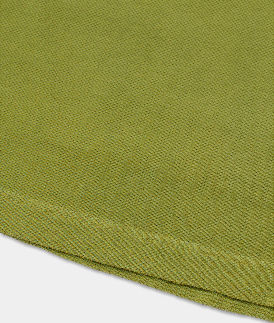 Olive green color woven fabric with a textured honeycomb pattern, displayed as a flat lay - Industry of All Nations