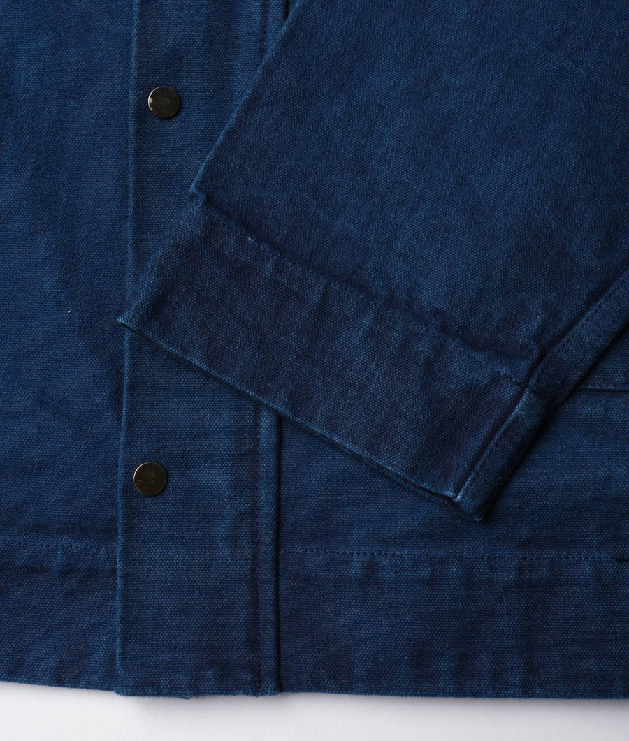 Dark blue organic cotton jacket detail shot - Industry of All Nations