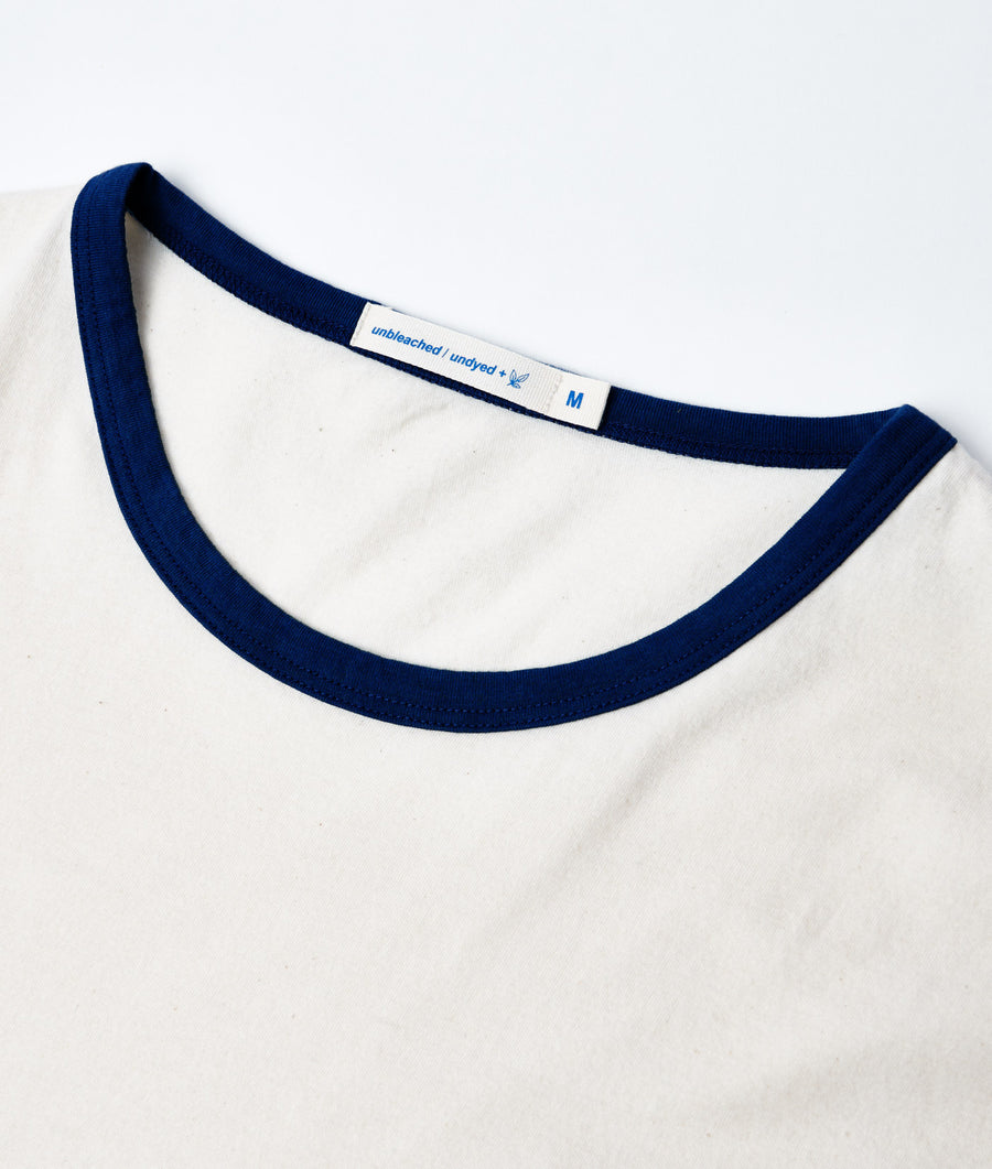 Close-up of a navy blue crew neck t-shirt by Industry of All Nations.