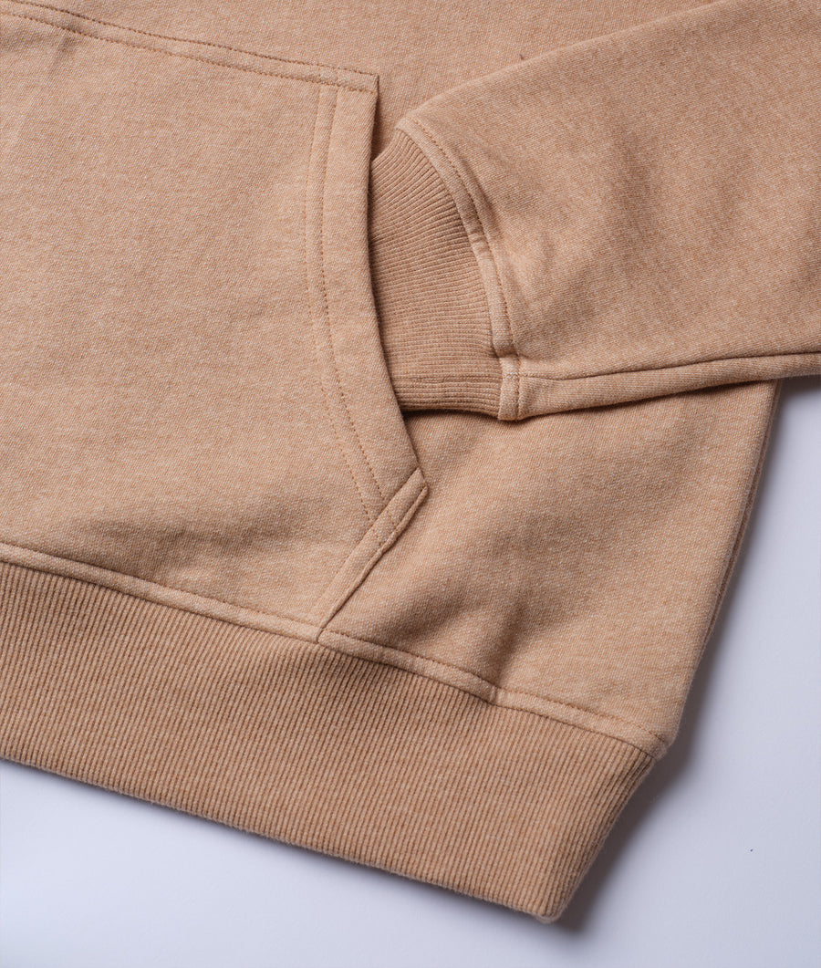 Flat lay detail shot of a beige cotton sweatshirt with ribbed cuffs and hem - Industry of All Nations