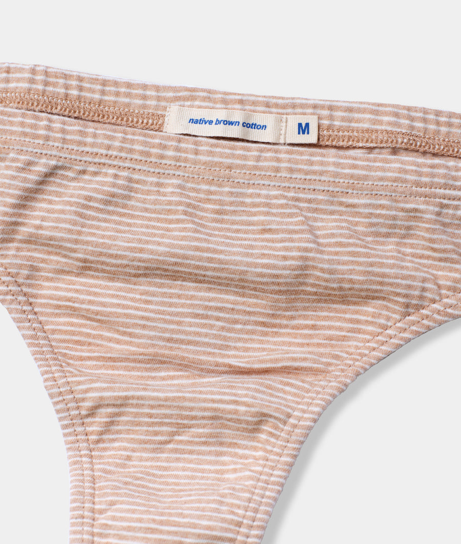 Tan and white striped underwear with "Native brown cotton" label, laid flat - Industry of All Nations