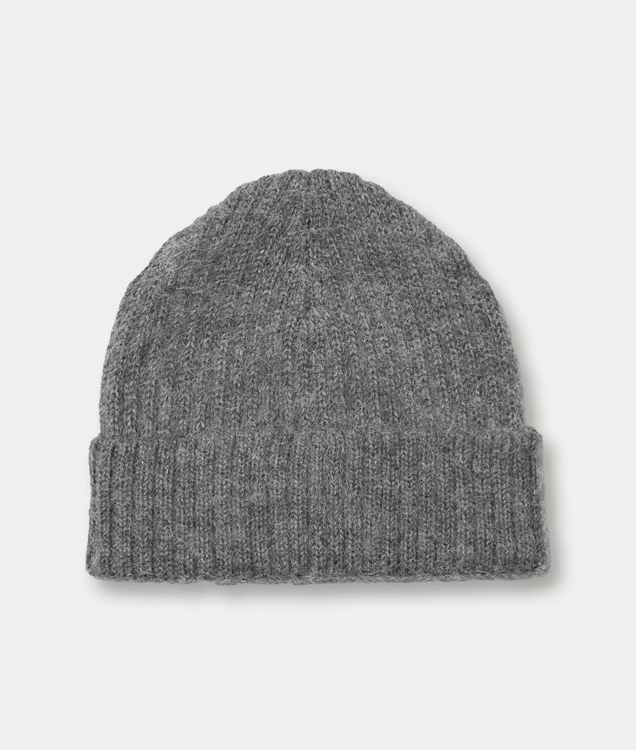 A gray knit beanie displayed on a plain white background - Industry of All Nations.