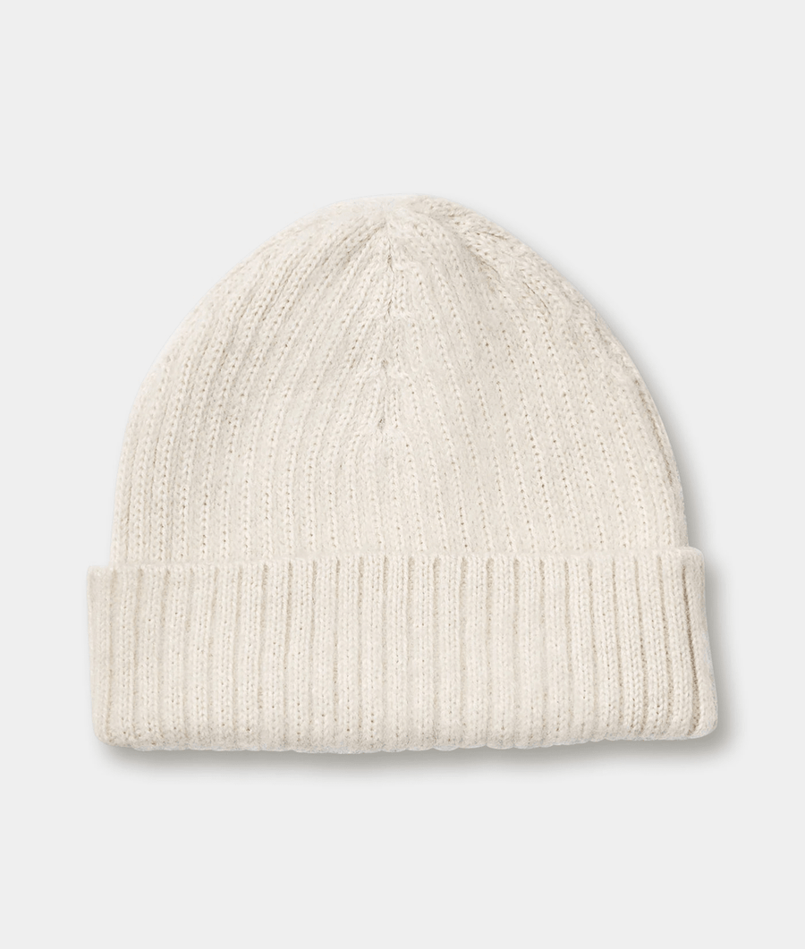 White knit beanie shown in flat lay - Industry of All Nations