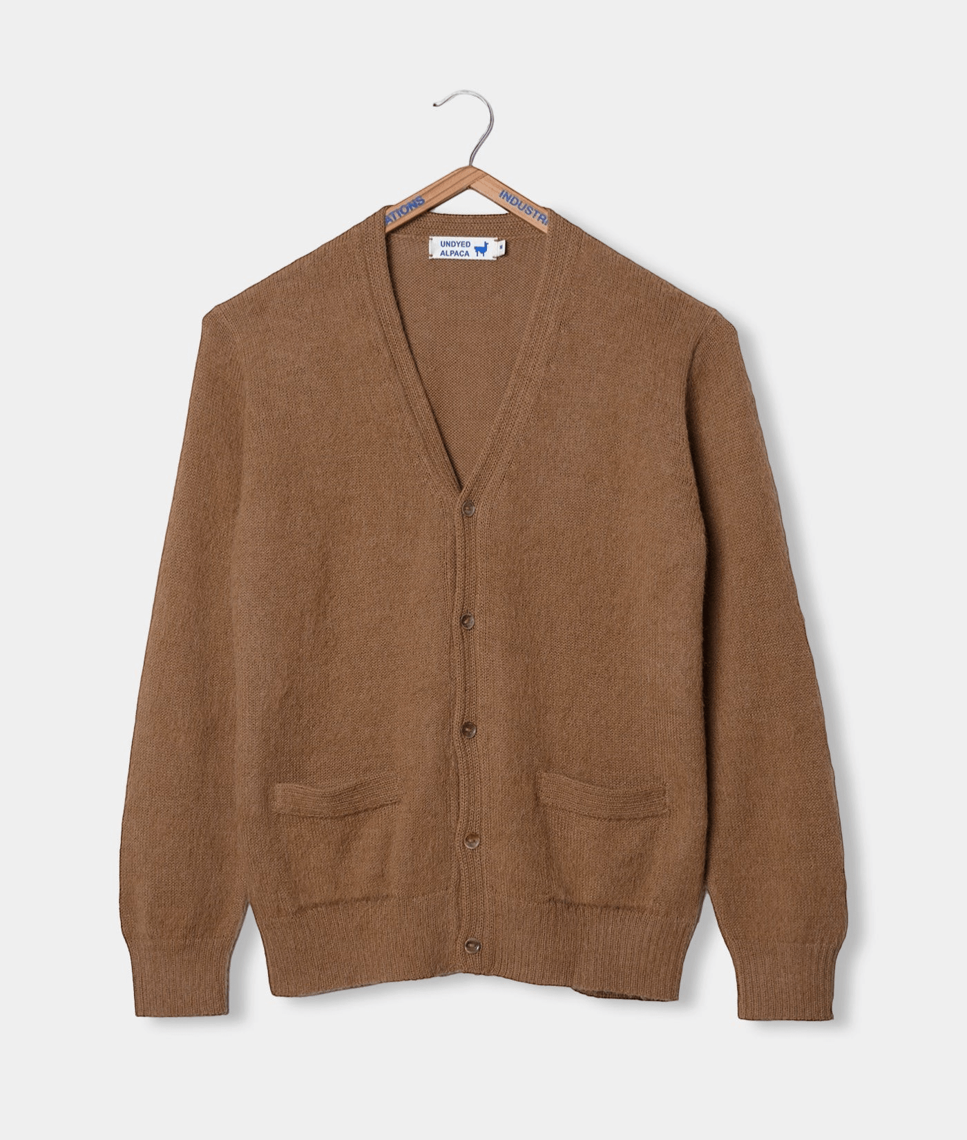 Tan-colored, woolen cardigan sweater in a front-facing, flat lay display - Industry of All Nations