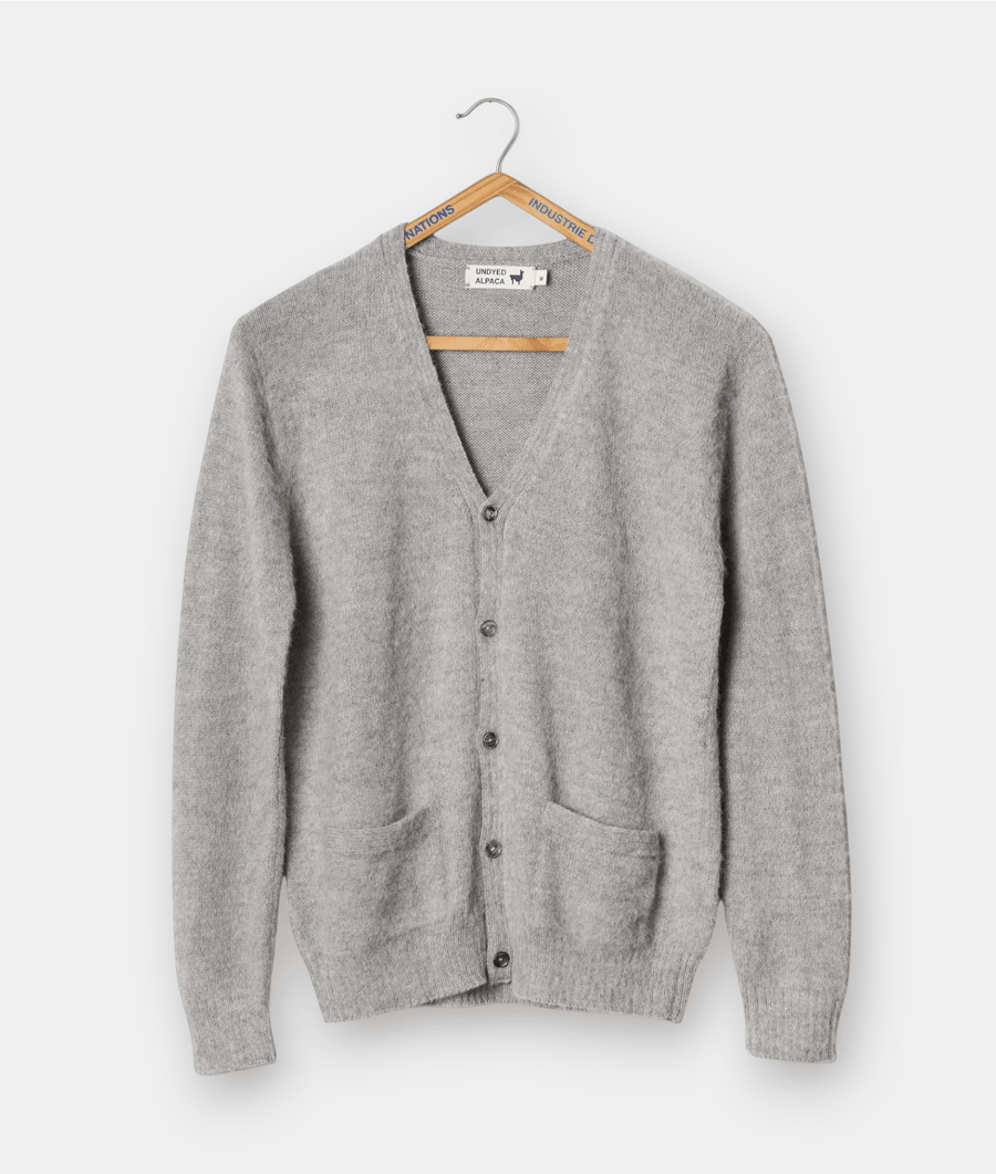 Gray alpaca cardigan sweater displayed on a wooden hanger - Industry of All Nations