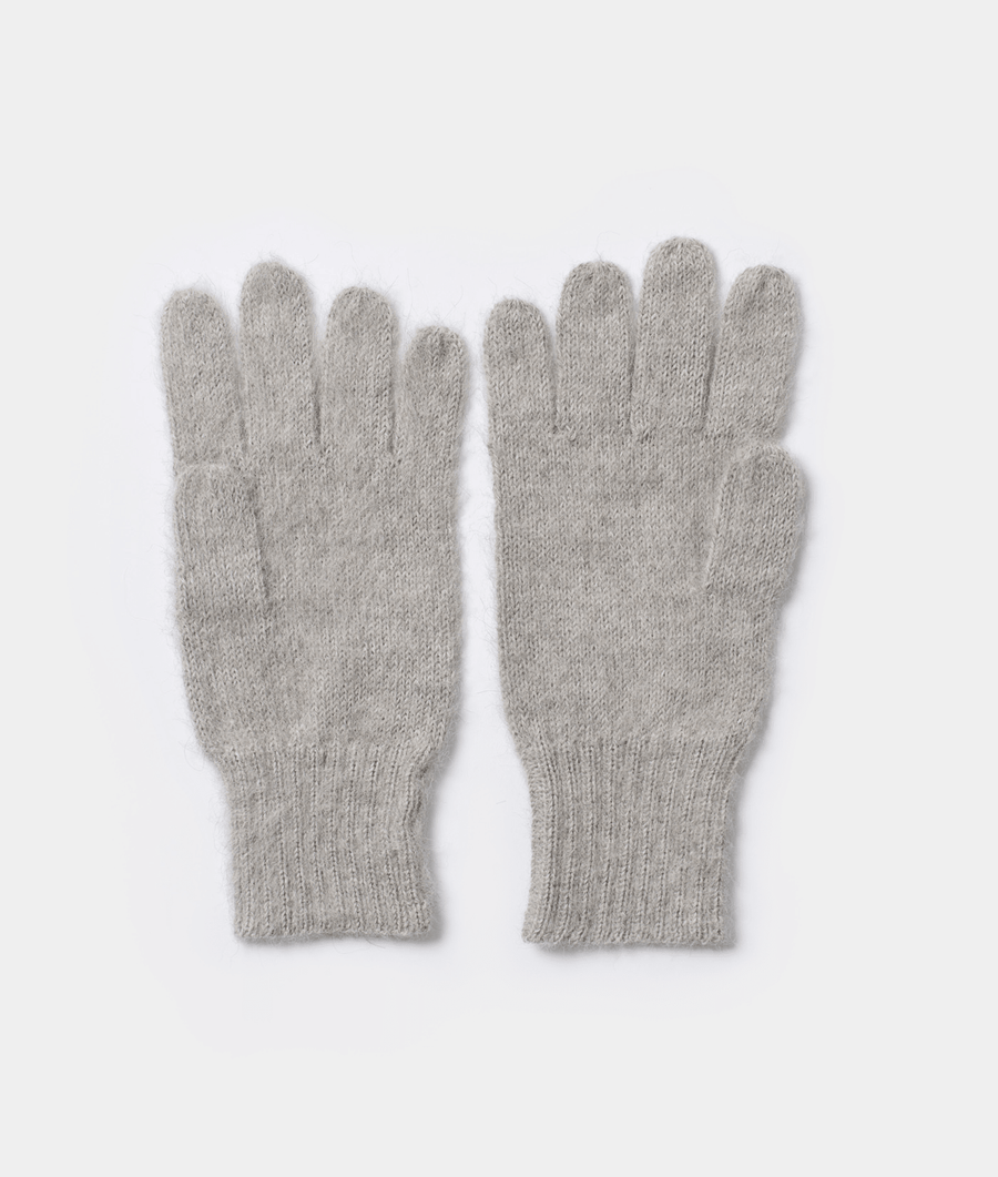 Grey wool knit gloves laid flat on a white background - Industry of All Nations