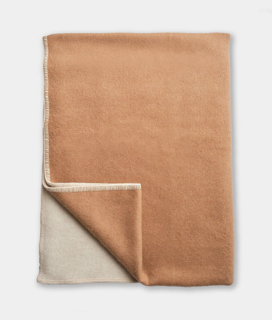 Camel colored alpaca throw blanket with a striped border, displayed flat on a white background - Industry of All Nations