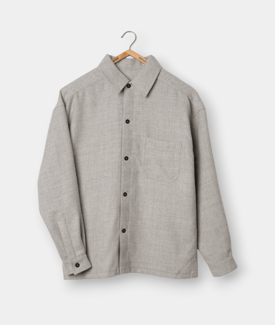 Gray wool button-down shirt displayed on a hanger - Industry of All Nations